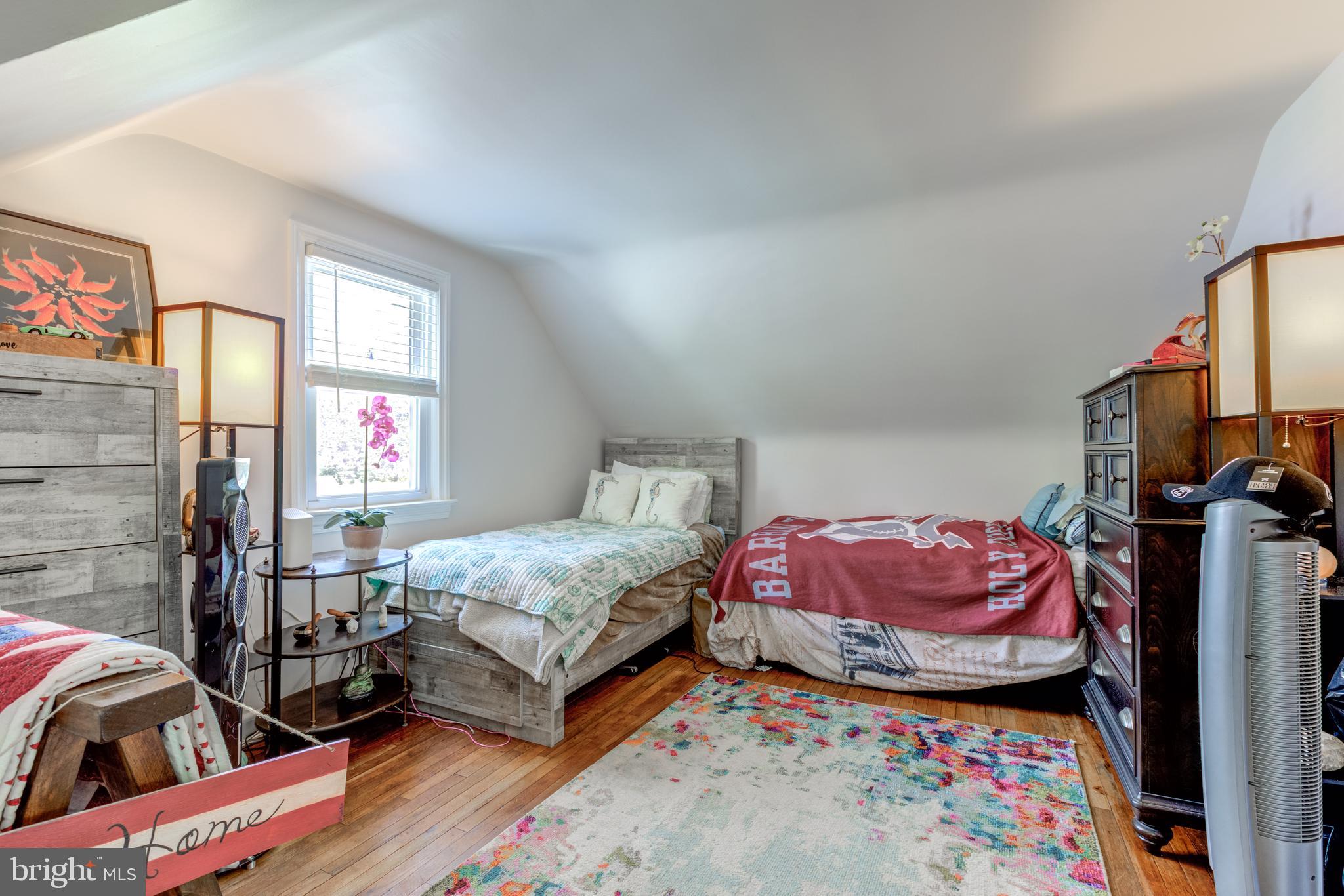121 Leconey Circle Palmyra, NJ 08065 - Photo 17 of 33 a bedroom with two beds and a painting on the wall