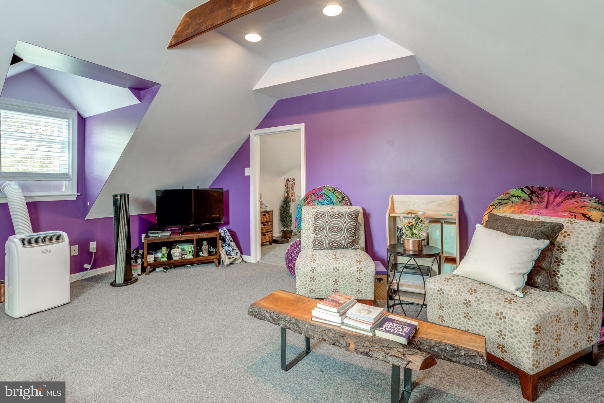 121 Leconey Circle Palmyra, NJ 08065 - Photo 24 of 33 a living room with furniture and a flat screen tv