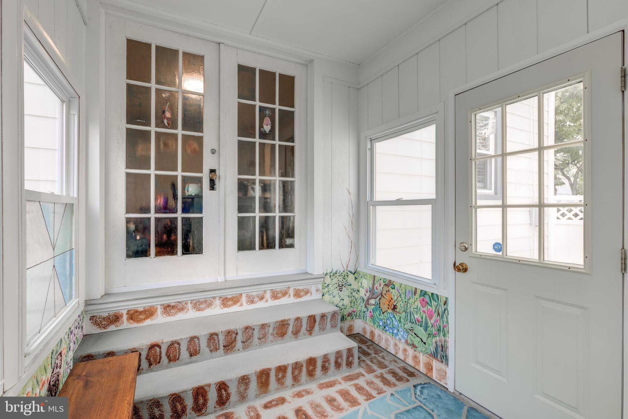 121 Leconey Circle Palmyra, NJ 08065 - Photo 29 of 33 a view of an entryway with wooden floor and windows