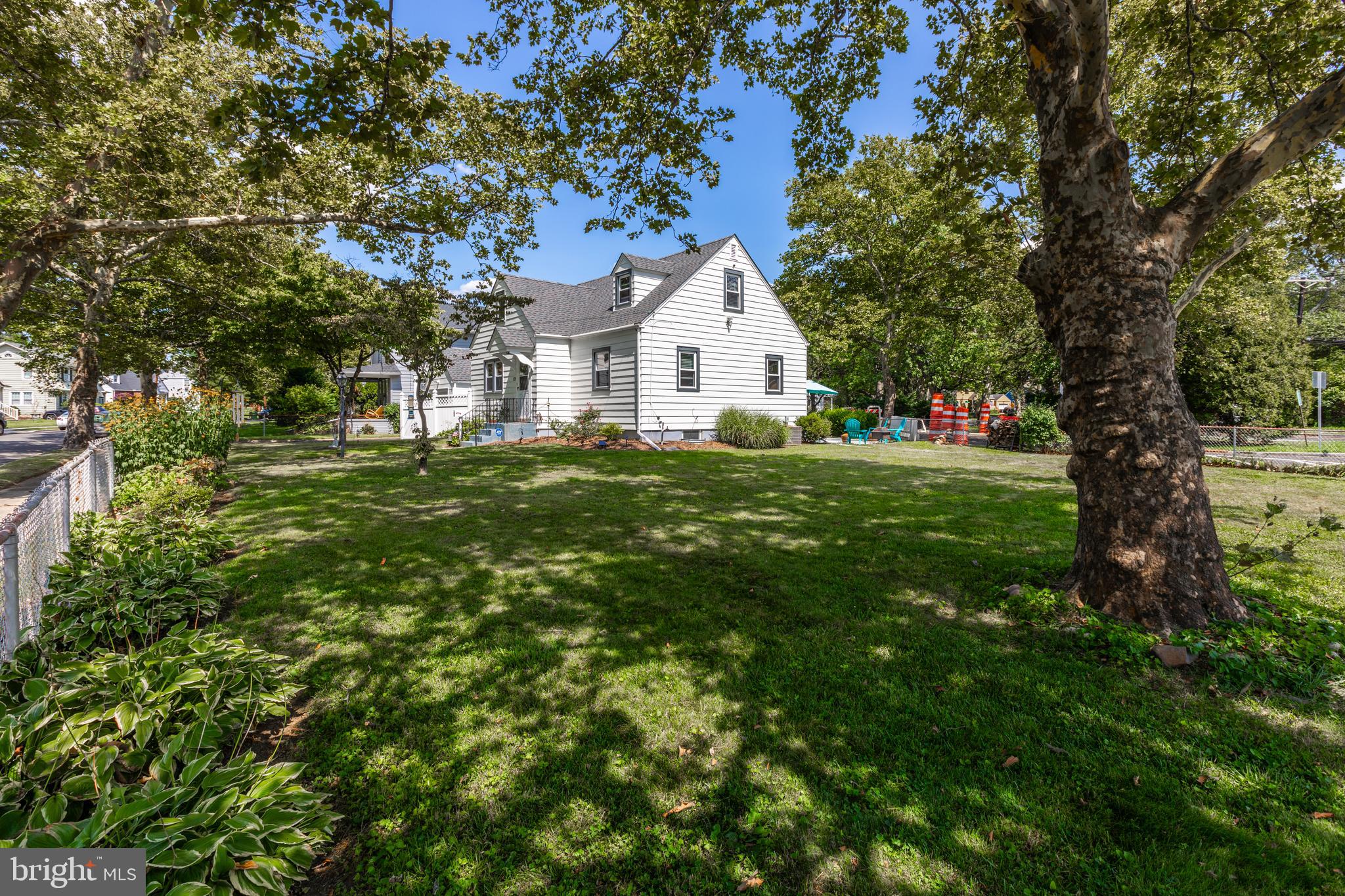 121 Leconey Circle Palmyra, NJ 08065 - Photo 30 of 33 a house with a tree in front of it
