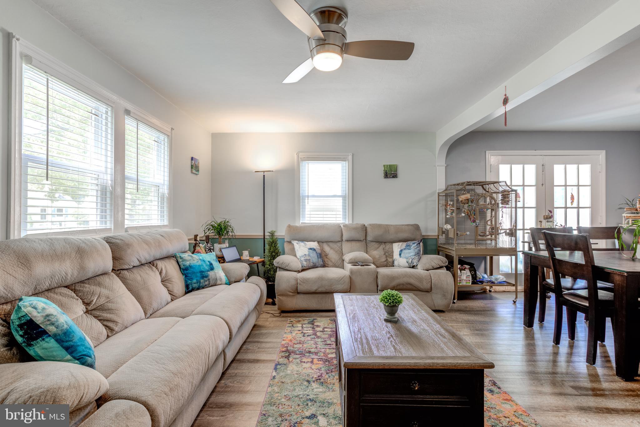121 Leconey Circle Palmyra, NJ 08065 - Photo 5 of 33 a living room with furniture and a large window