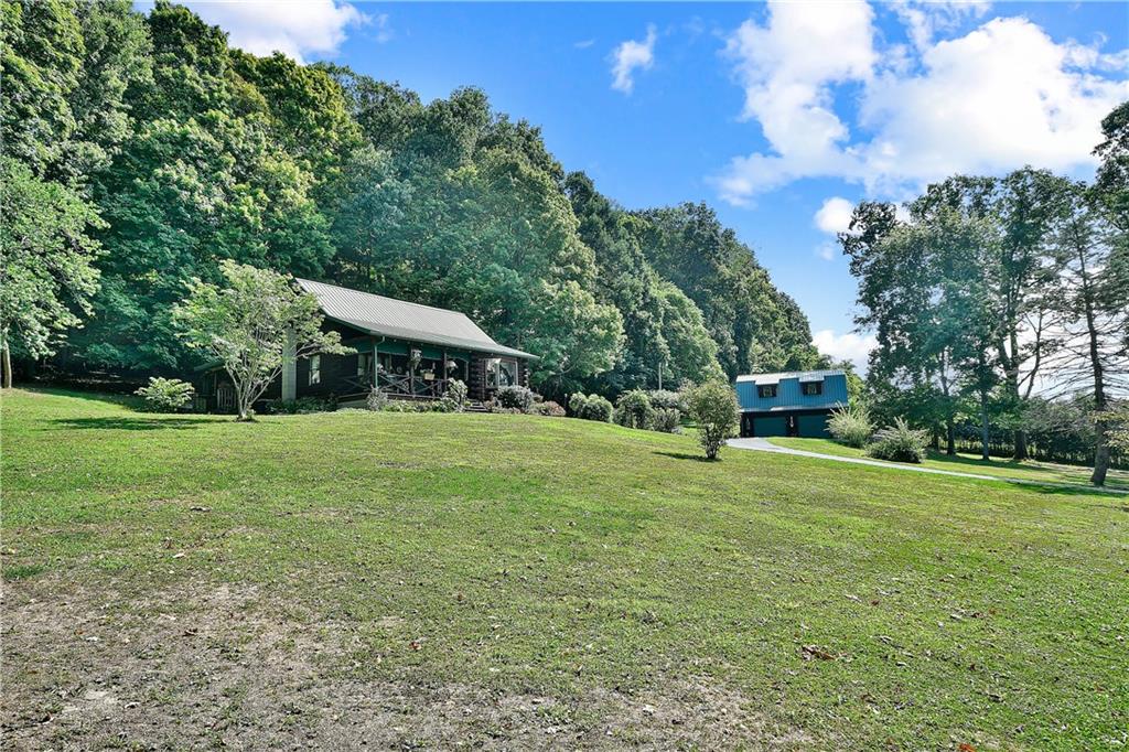 69 Lover Jonestown Road Charleroi, PA 15022 - Photo 1 of 46 Own a Stunning Log Home with Oil & Gas Rights!