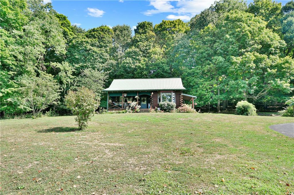 69 Lover Jonestown Road Charleroi, PA 15022 - Photo 4 of 46 Custom-built log home, nestled on 3.748 picturesque, private and flat acres