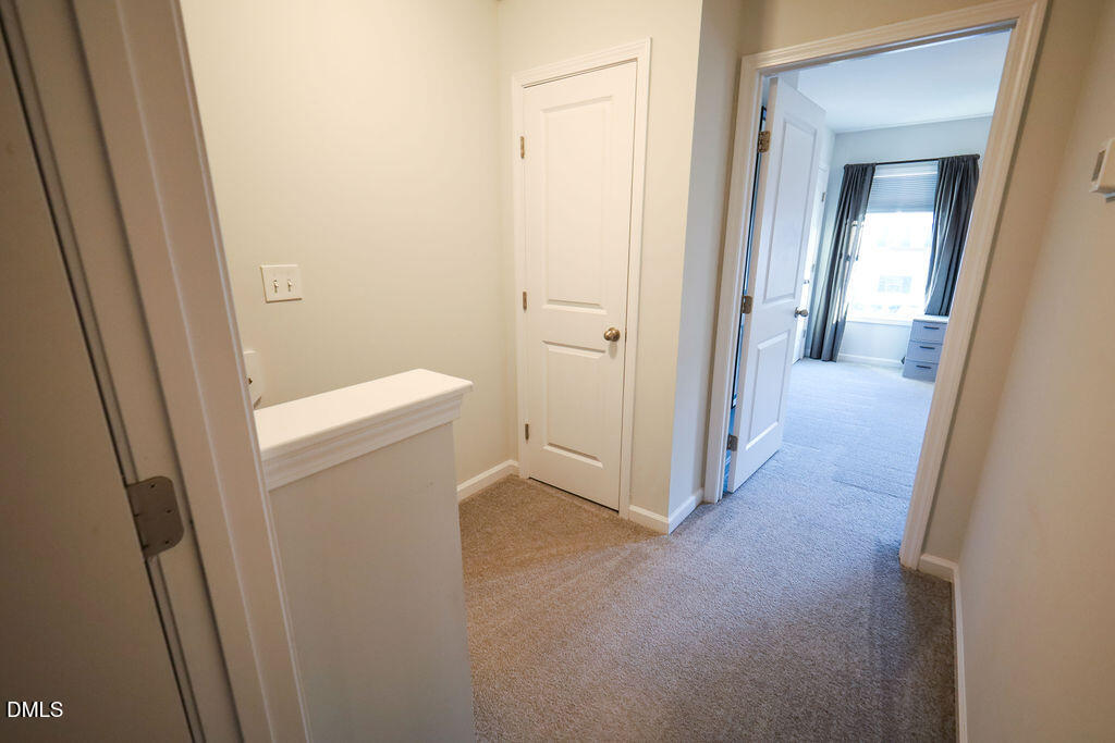 230 South Raleigh Street Angier, NC 27501 - Photo 23 of 38 a view of a hallway with closet