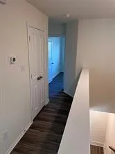 a view of kitchen with sink and microwave