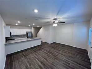 a bathroom with a toilet a sink and bathtub