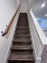 a kitchen with a refrigerator sink and stove