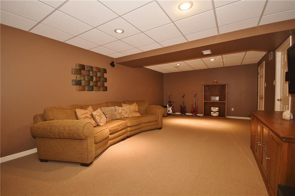 108 Lori Road Gibsonia, PA 15044 - Photo 20 of 25 Finished basement. There is a full bath - 2nd door on the right.
