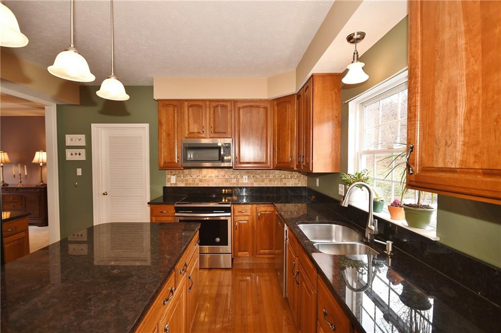 108 Lori Road Gibsonia, PA 15044 - Photo 6 of 25 Cherry cabinets