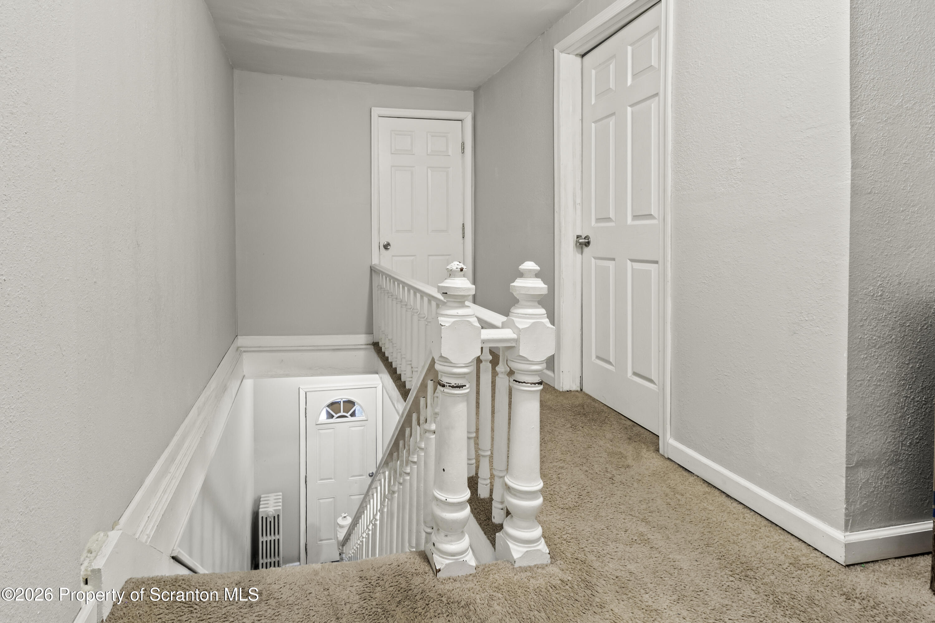 208 Sanderson Avenue Olyphant, PA 18447 - Photo 11 of 31 a view of a livingroom with water heater
