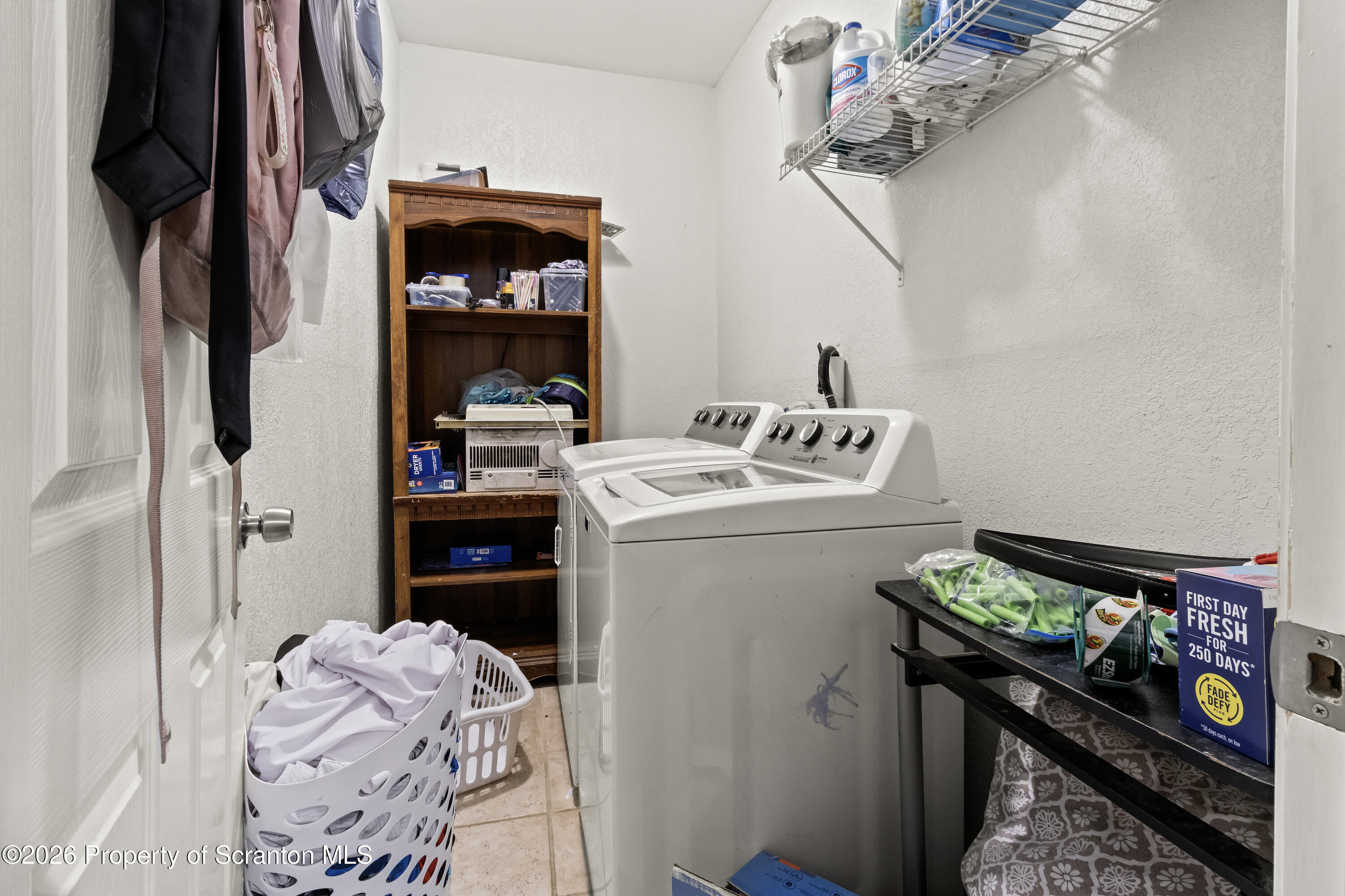 208 Sanderson Avenue Olyphant, PA 18447 - Photo 17 of 31 a utility room with dryer and washer
