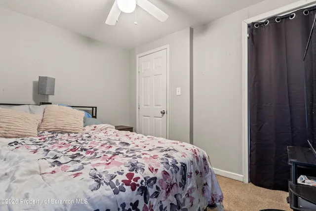 a children room with toys and a book shelf