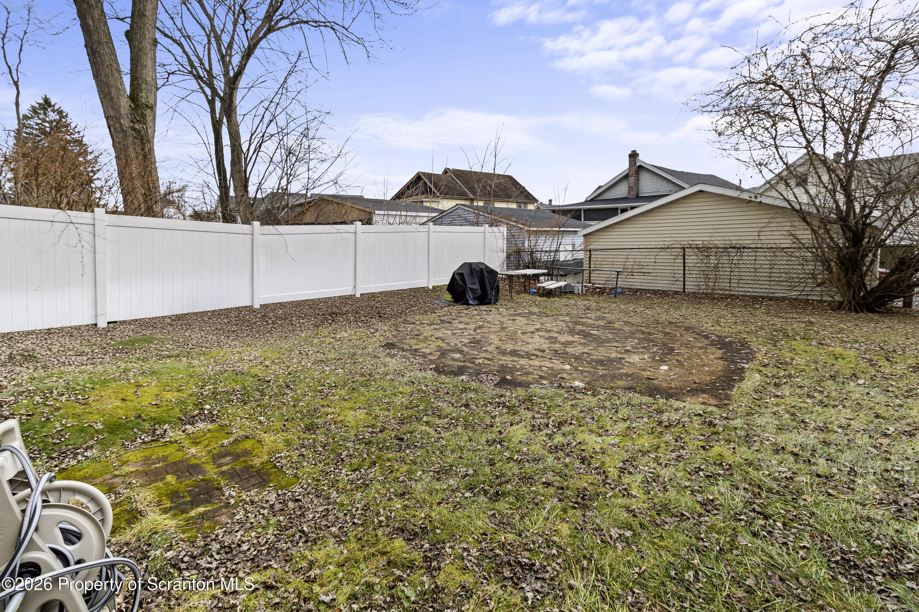 208 Sanderson Avenue Olyphant, PA 18447 - Photo 5 of 31 a view of a house with a yard
