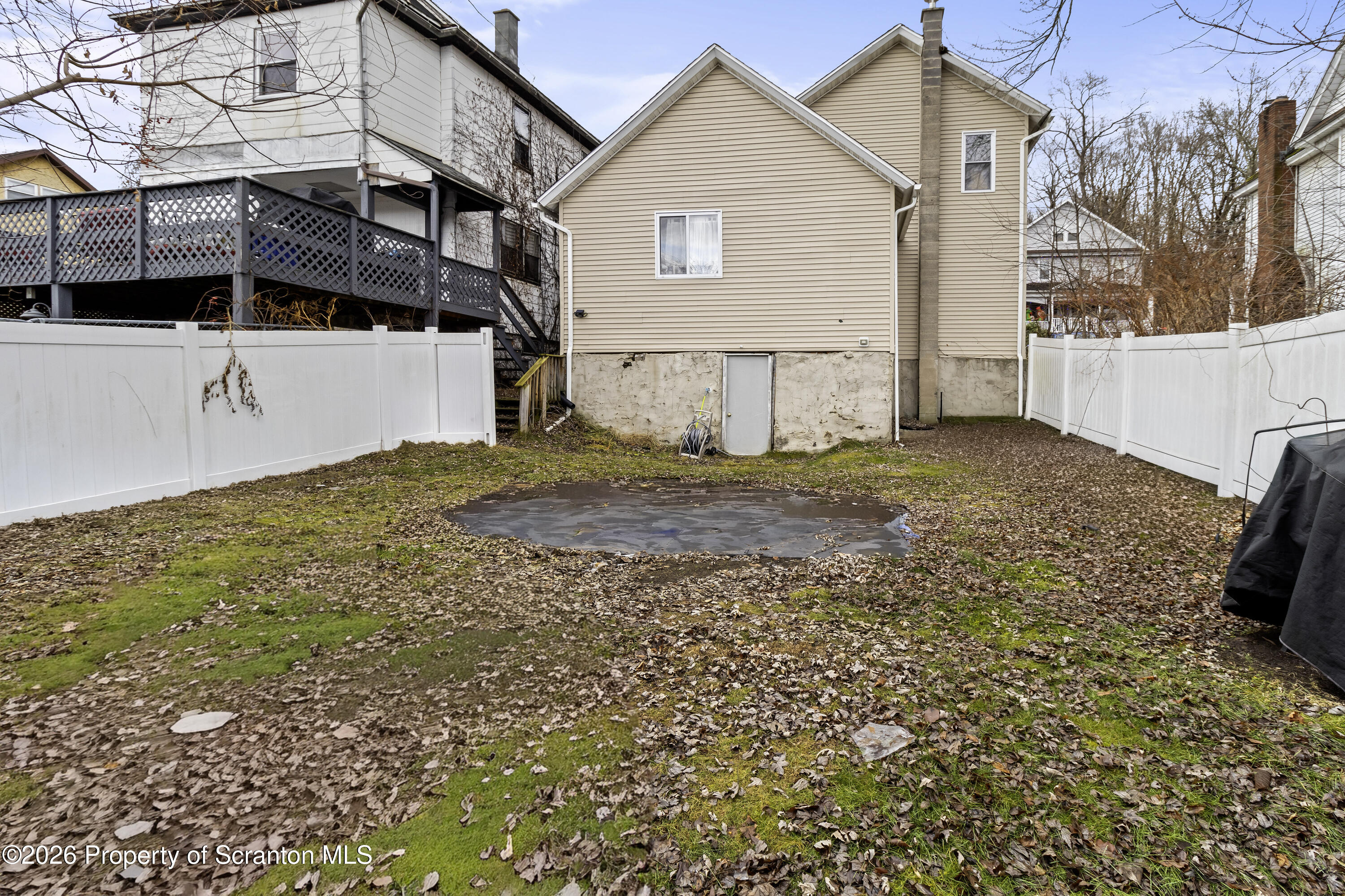 208 Sanderson Avenue Olyphant, PA 18447 - Photo 6 of 31 a view of a house with a yard