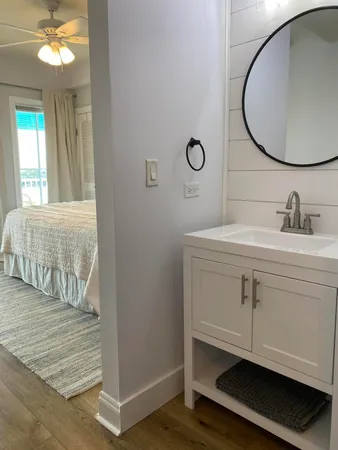 a bathroom with a toilet and a sink