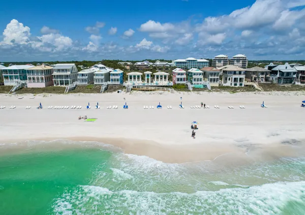 an aerial view of a house with a lake view
