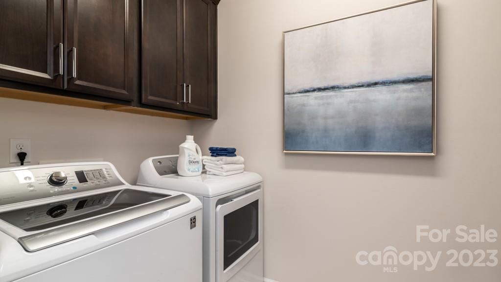 13219 Chopin Ridge Road Huntersville, NC 28078 - Photo 18 of 37 a utility room with dryer and washer