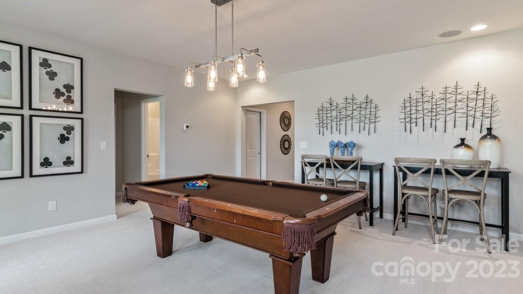 13219 Chopin Ridge Road Huntersville, NC 28078 - Photo 20 of 37 a pool table and chairs in a room