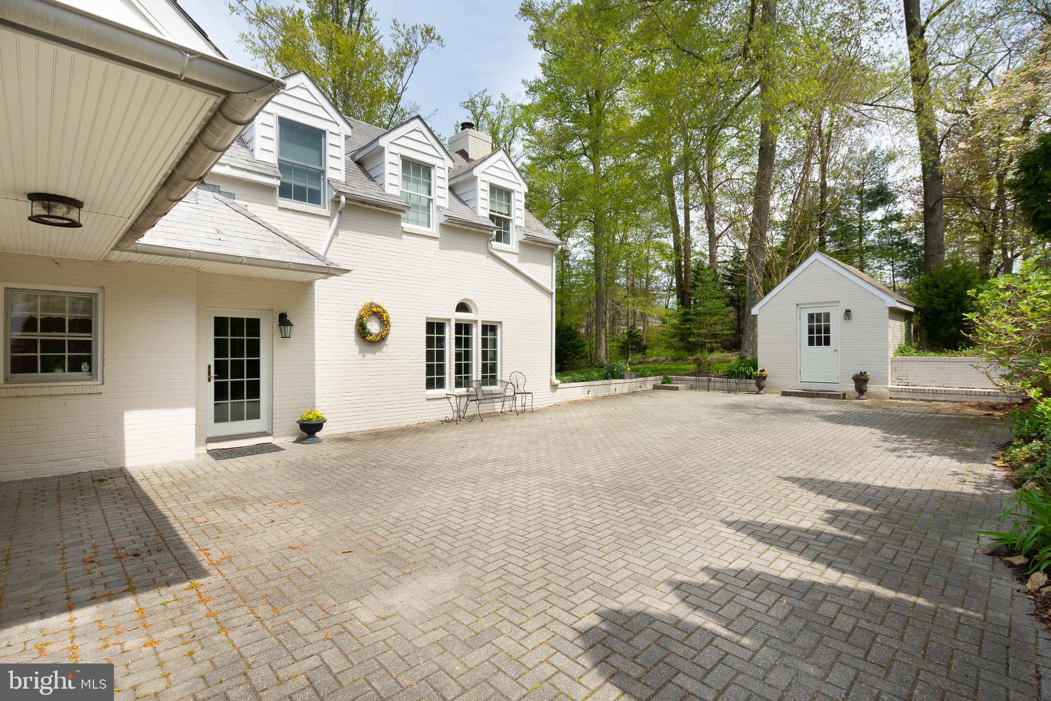 1010 Overbrook Road Wilmington, DE 19807 - Photo 37 of 41 Hardscaped parking area, brick shed