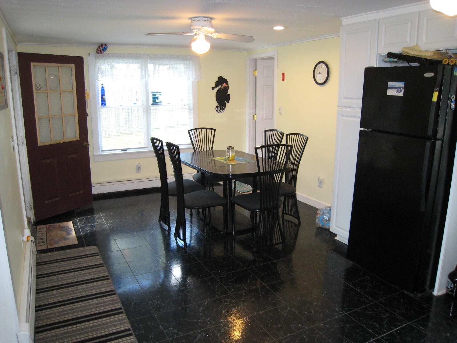 41 Naushon Road Dennis Port, MA 02639 - Photo 6 of 22 a view of a dining room with furniture and wooden floor