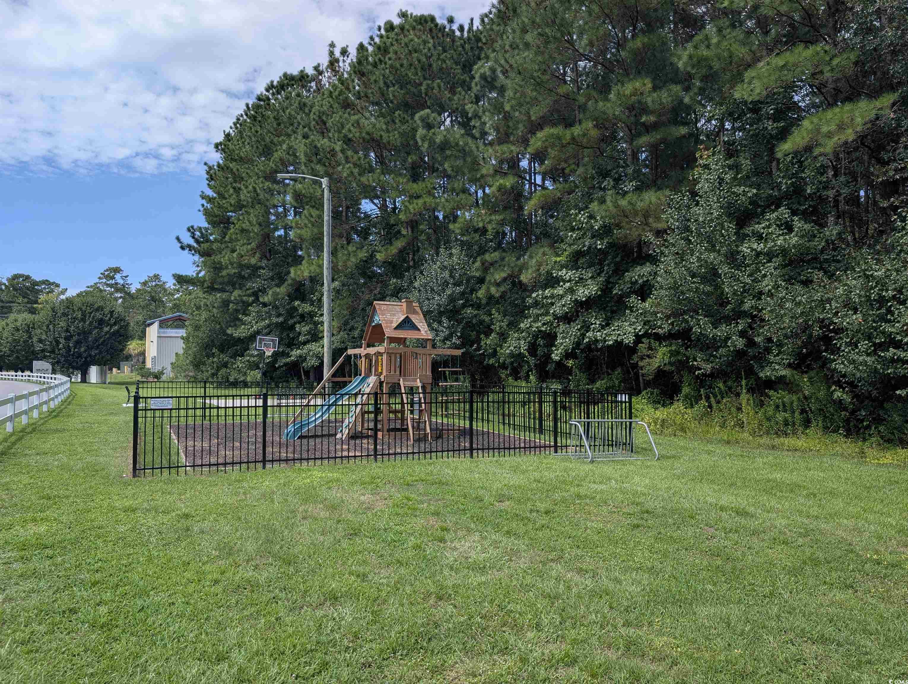 1013 Autumn Drive Murrells Inlet, SC 29576 - Photo 31 of 36 View of playground with basketball court and benches.