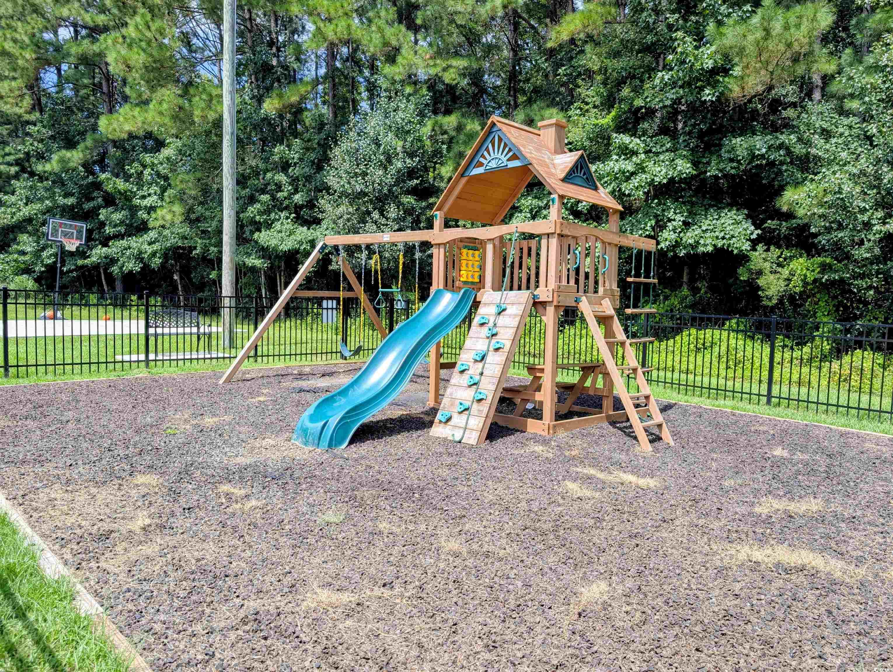 1013 Autumn Drive Murrells Inlet, SC 29576 - Photo 32 of 36 View of play area featuring view of wooded area