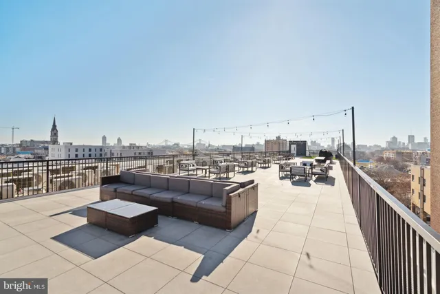 a view of roof deck with seating space