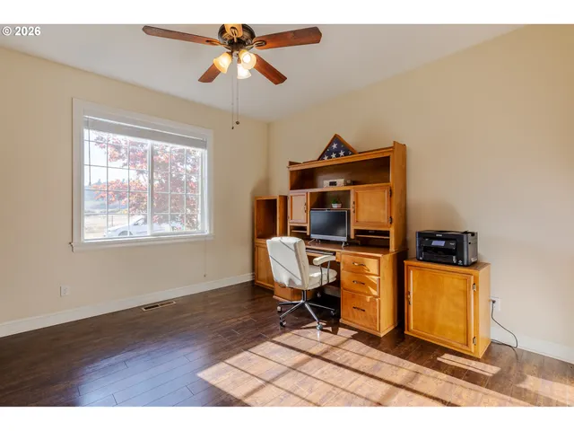 a workspace with furniture and window