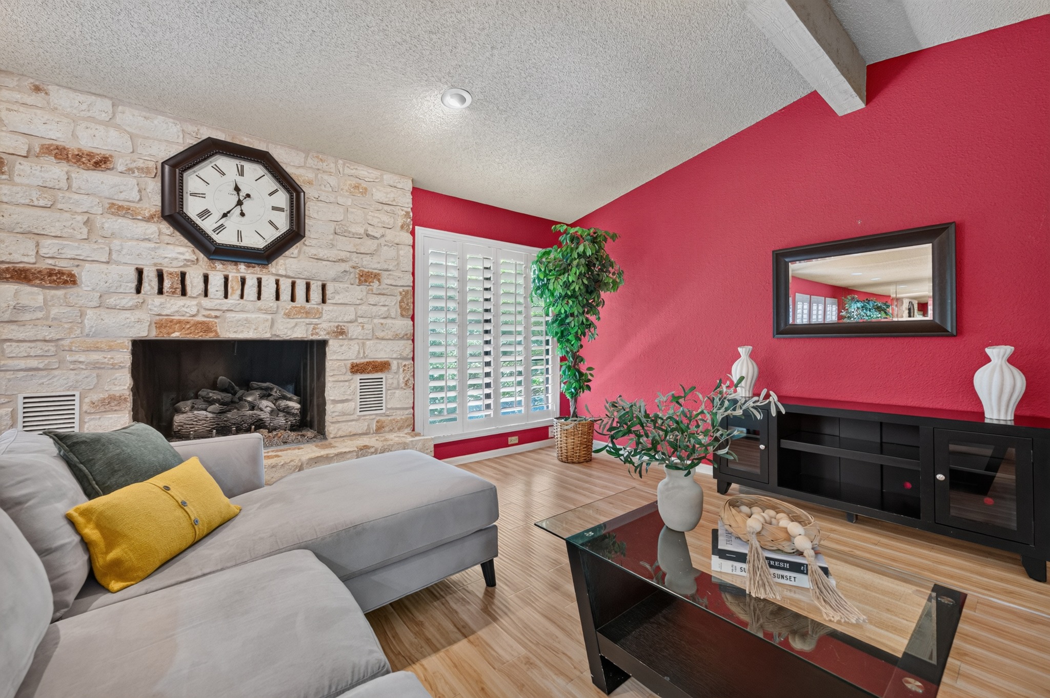 Cozy fireside seating area with warm architectural character.