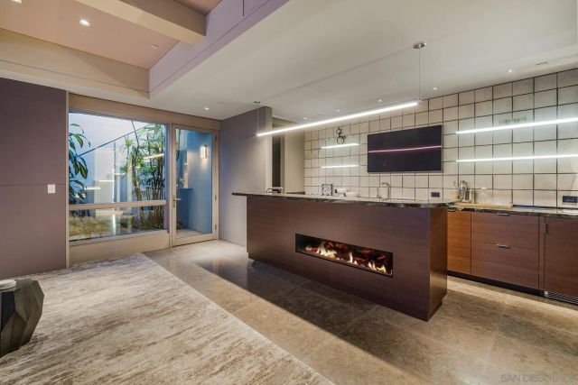 a bathroom with a toilet and shower