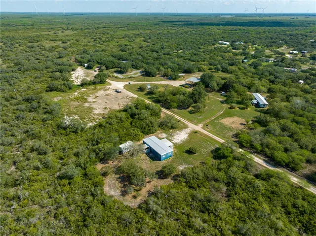 a view of a lake with a houses