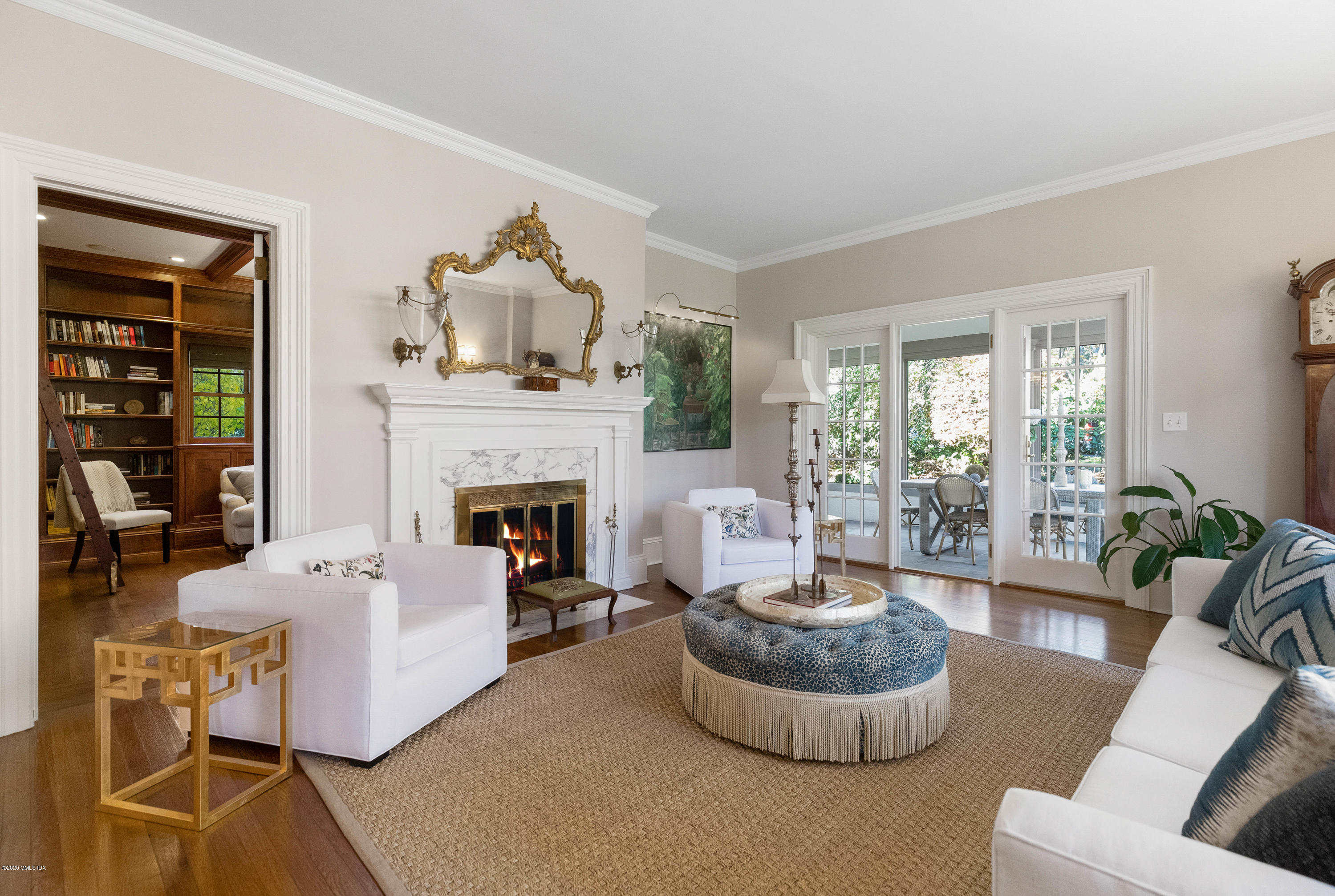 7 Brookside Park Greenwich, CT 06831 - Photo 13 of 52 a living room with furniture and a fireplace