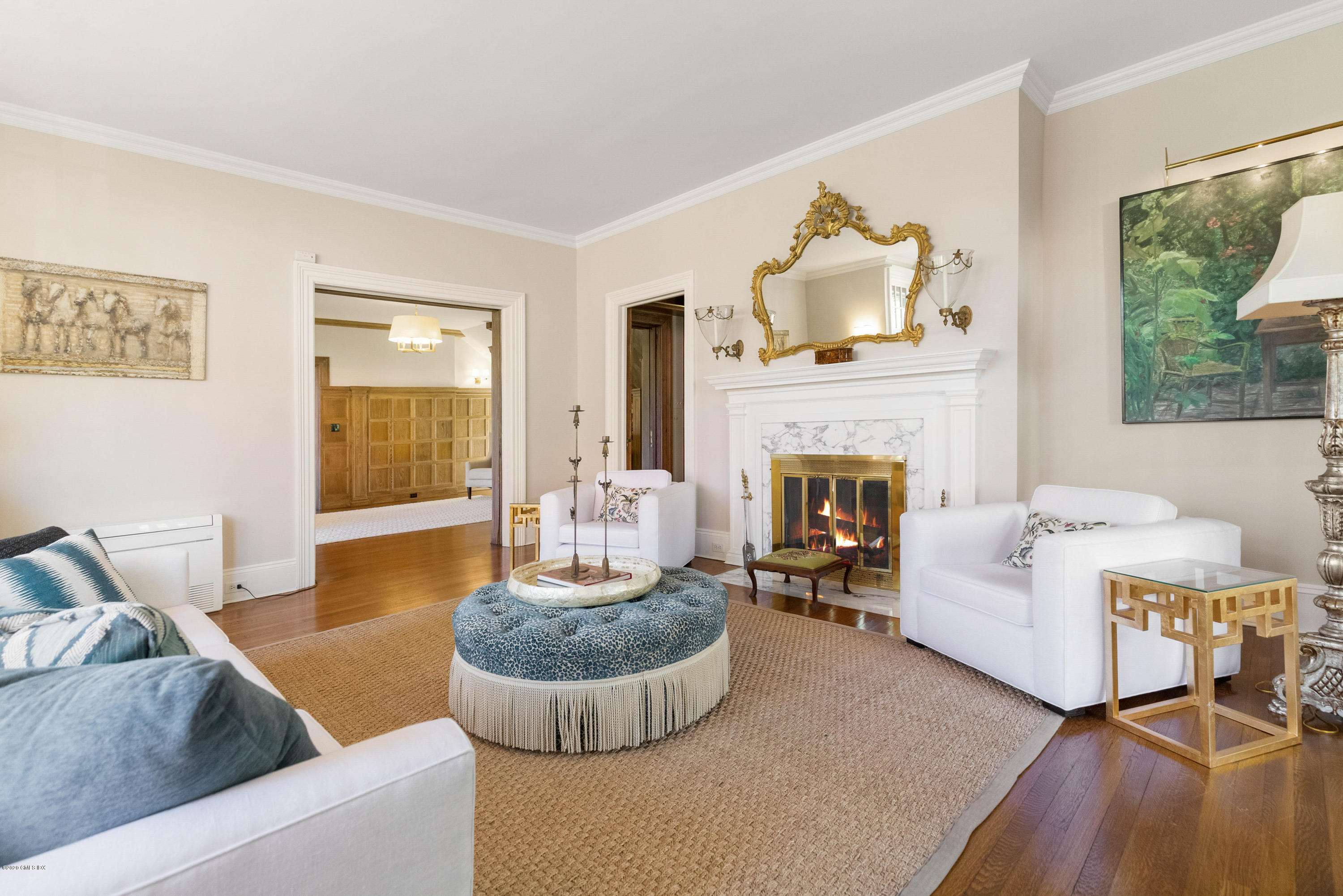 7 Brookside Park Greenwich, CT 06831 - Photo 14 of 52 a living room with furniture and a fireplace