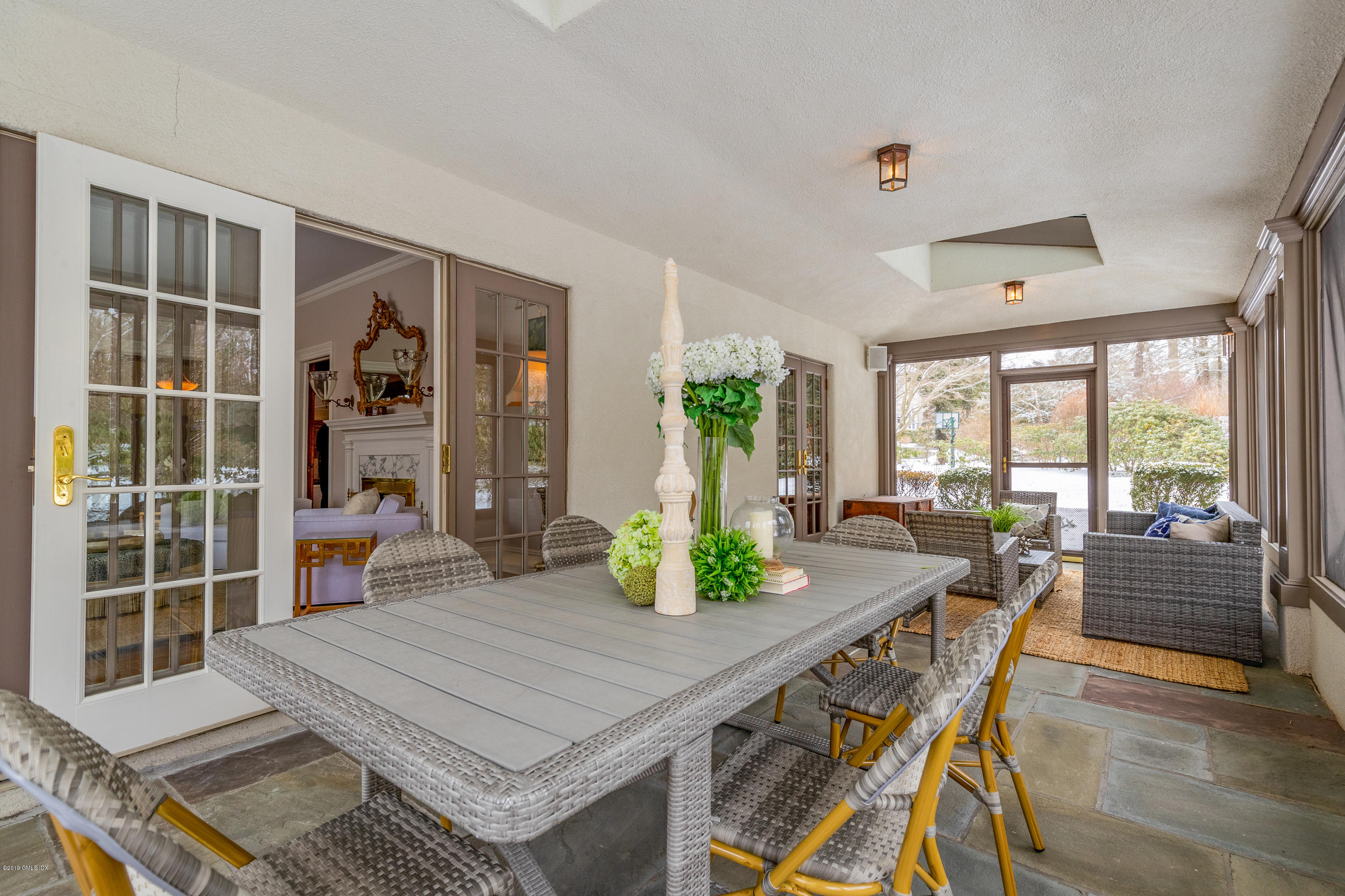 7 Brookside Park Greenwich, CT 06831 - Photo 17 of 52 a view of a dining room with furniture window and wooden floor