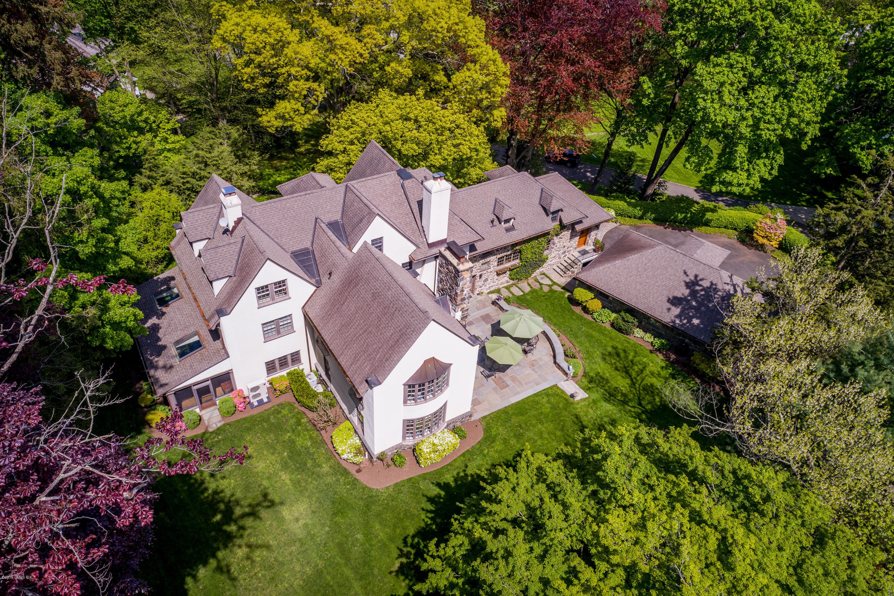 7 Brookside Park Greenwich, CT 06831 - Photo 2 of 52 an aerial view of residential house with outdoor space and swimming pool