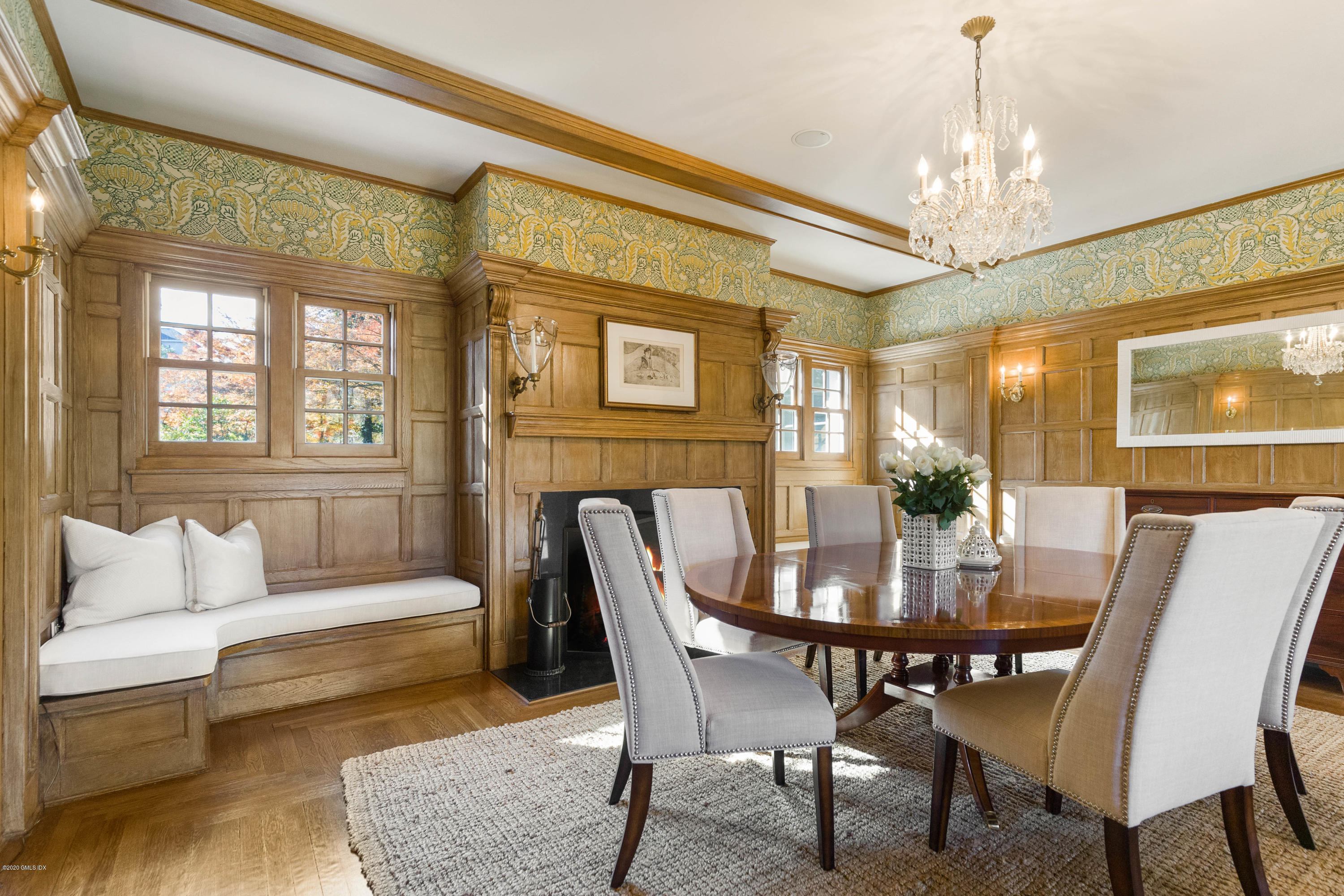 7 Brookside Park Greenwich, CT 06831 - Photo 28 of 52 a view of a dining room with furniture and a chandelier