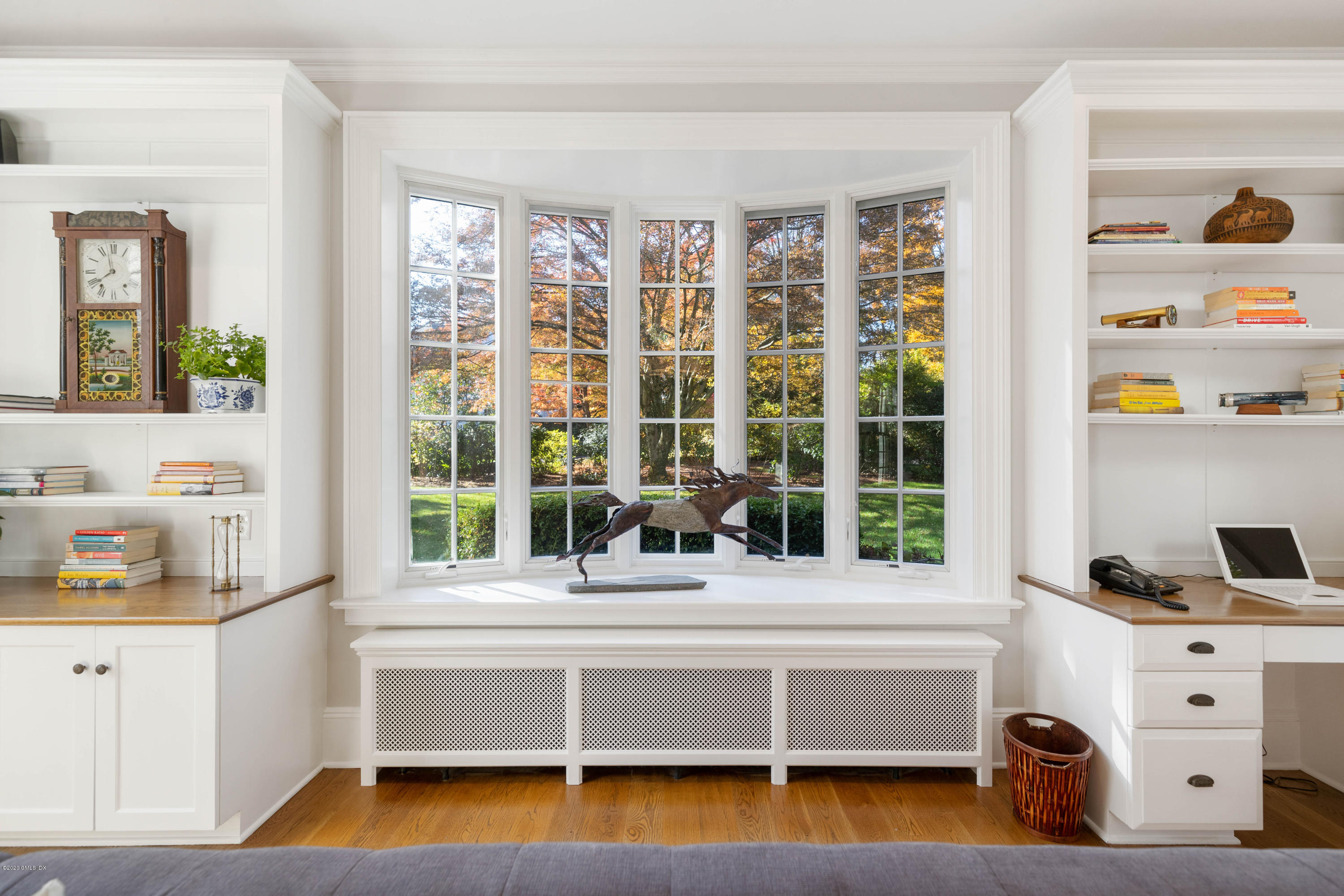 7 Brookside Park Greenwich, CT 06831 - Photo 31 of 52 a living room with fireplace furniture and a large window