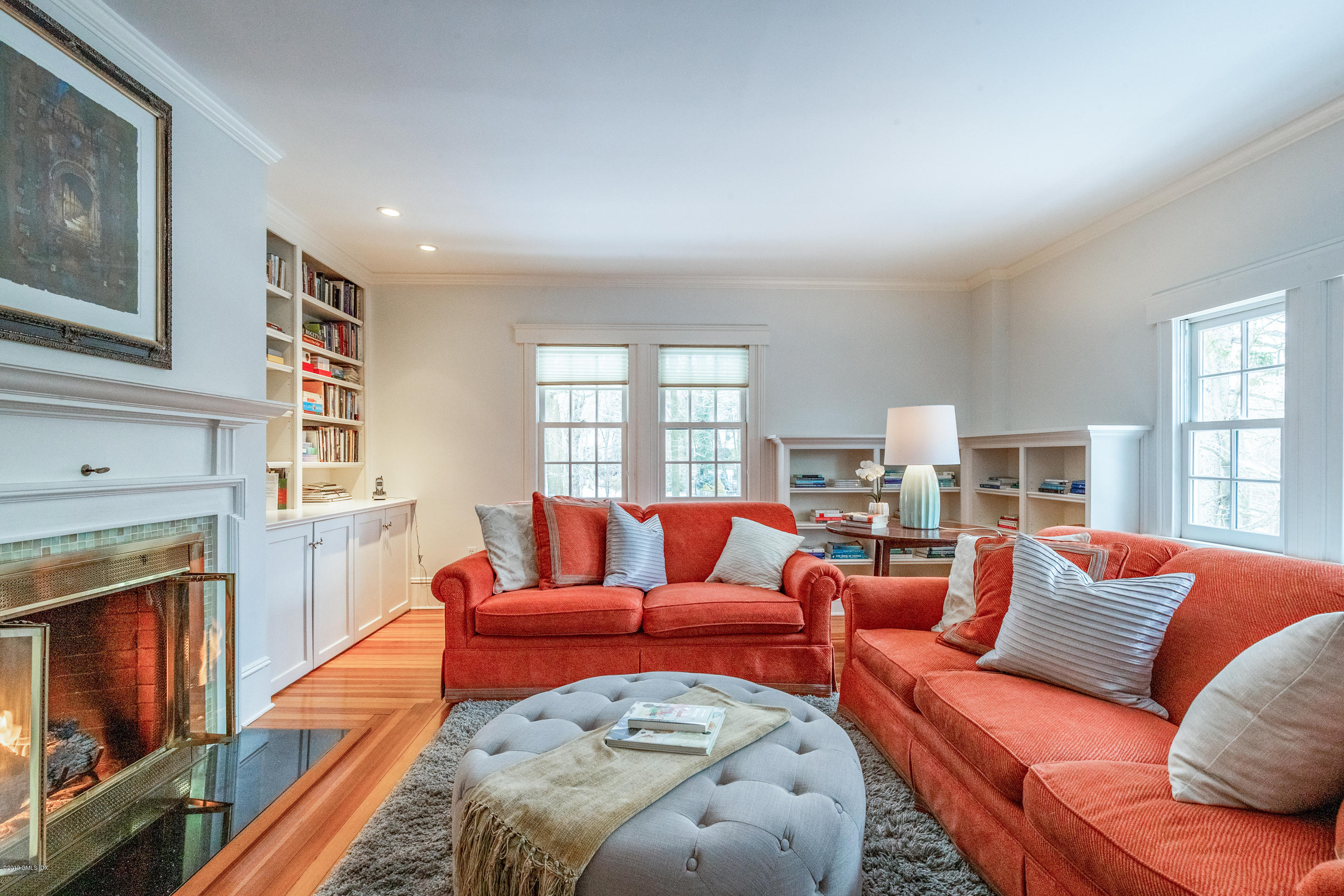 7 Brookside Park Greenwich, CT 06831 - Photo 38 of 52 a living room with furniture a fireplace