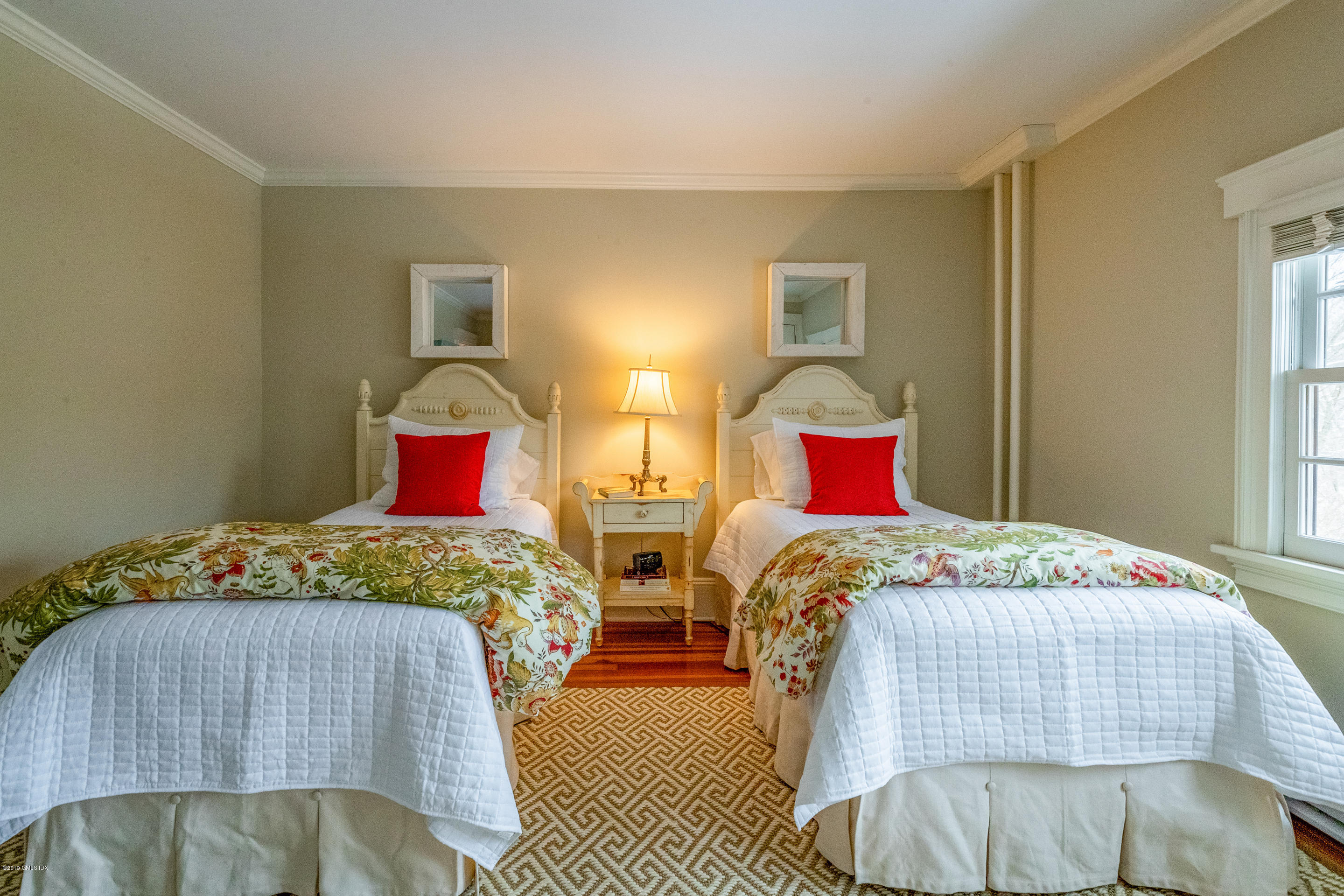 7 Brookside Park Greenwich, CT 06831 - Photo 39 of 52 a bedroom with two bed and window