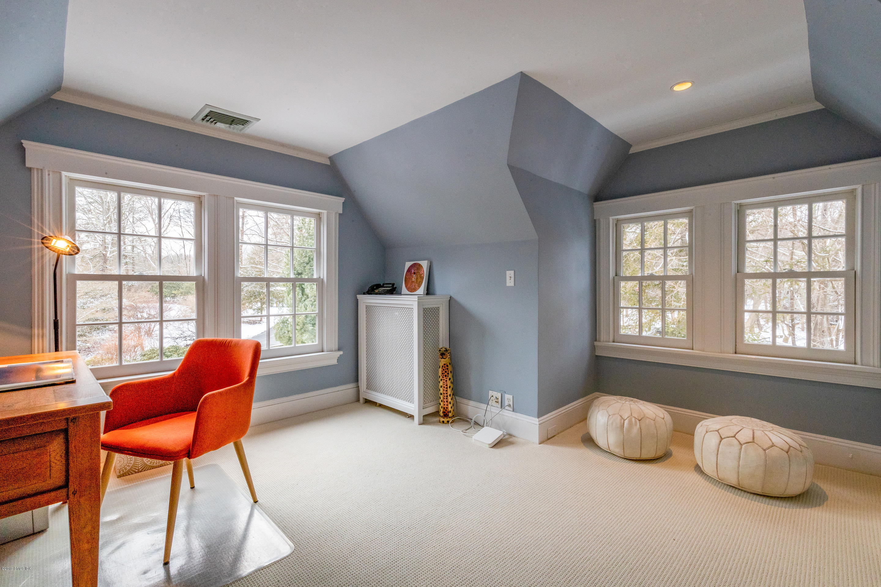 7 Brookside Park Greenwich, CT 06831 - Photo 42 of 52 a bedroom with furniture and a window