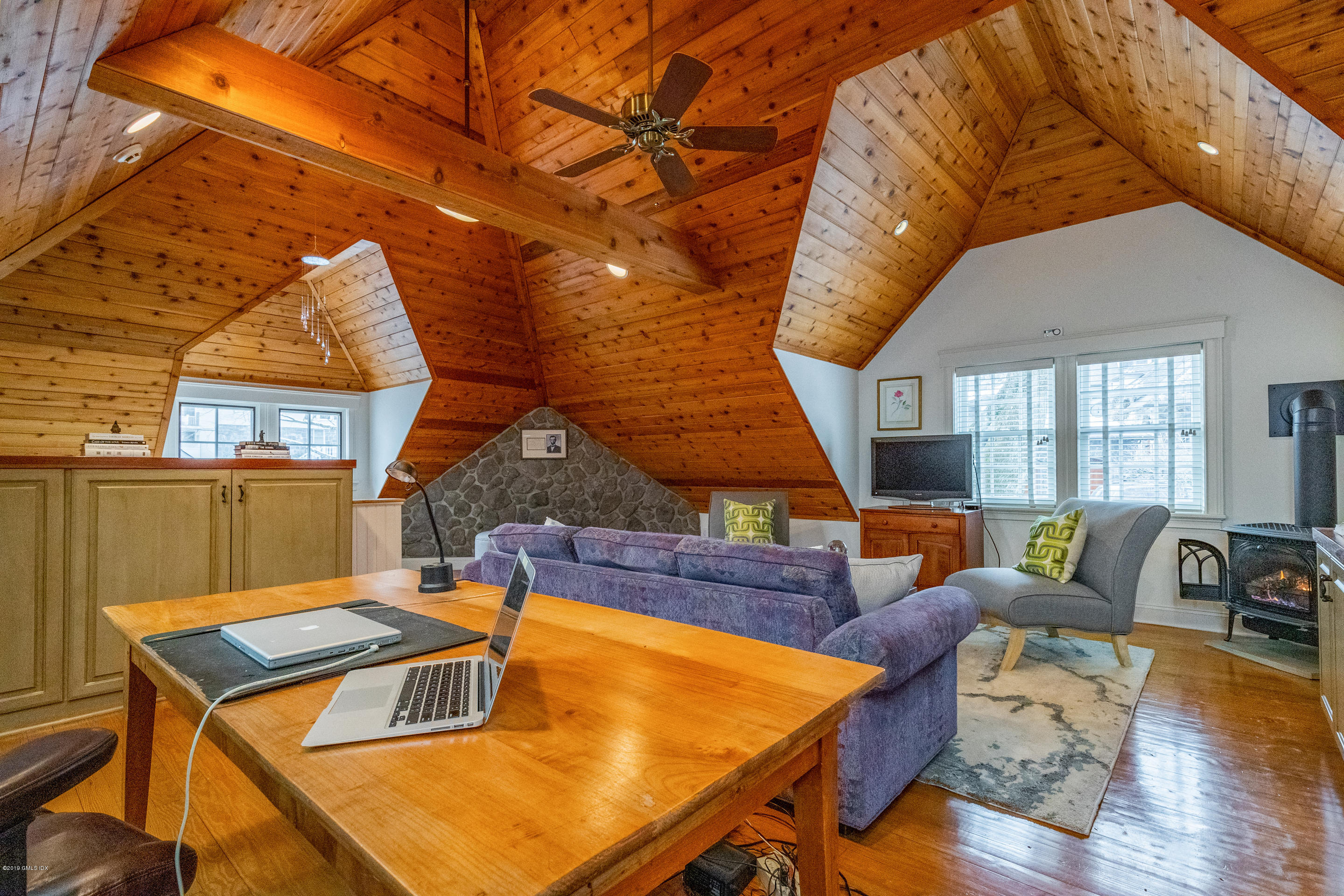 7 Brookside Park Greenwich, CT 06831 - Photo 47 of 52 a living room with furniture a window and wooden floor