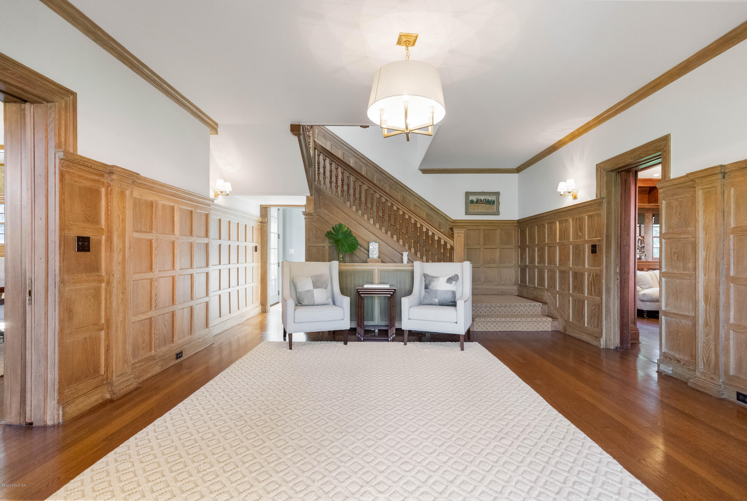 7 Brookside Park Greenwich, CT 06831 - Photo 9 of 52 a living room with furniture and wooden floor