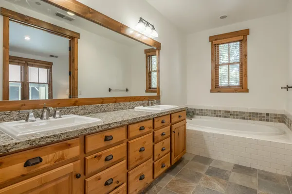 a close view of a bathtub in bathroom