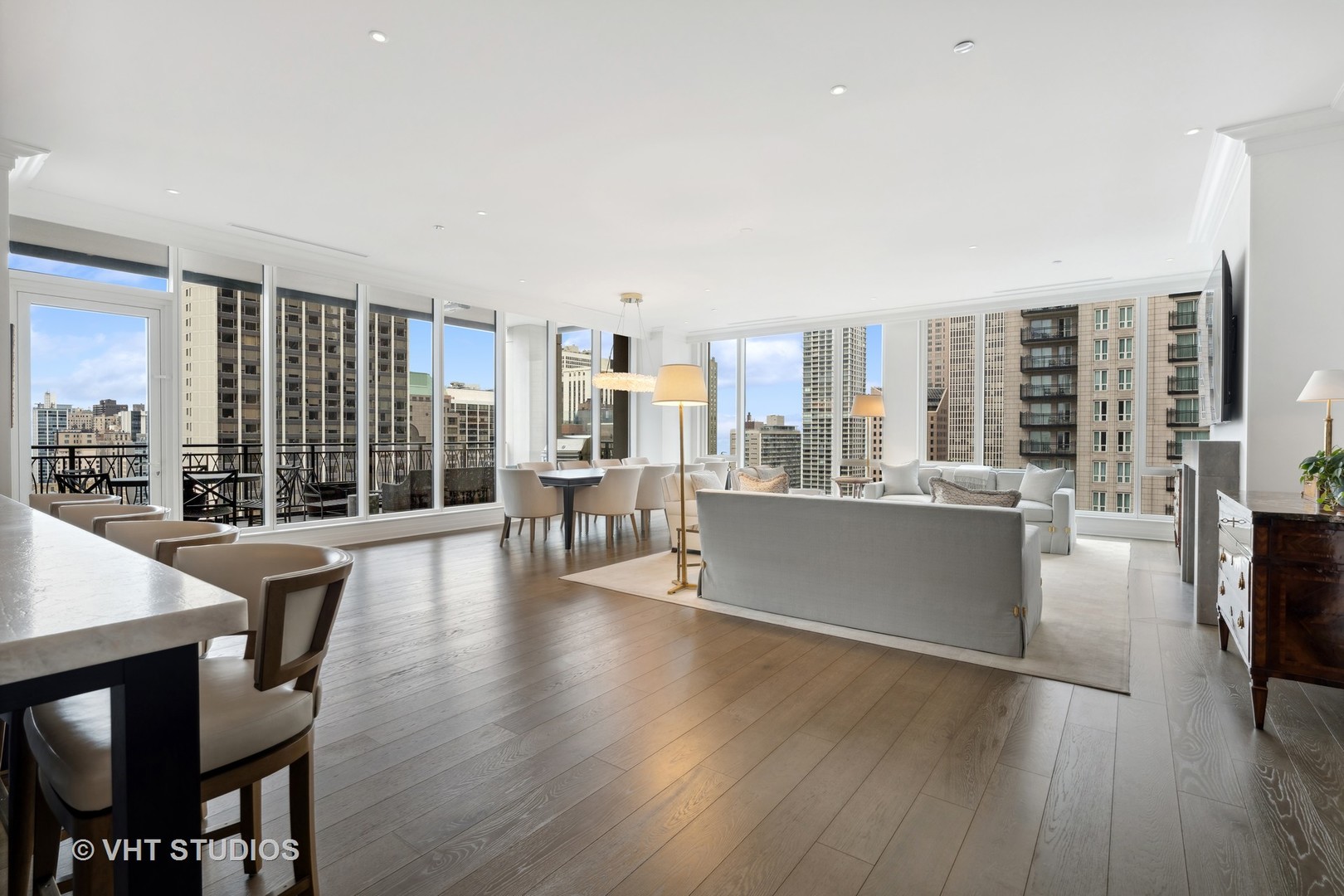 9 West Walton Street, Unit 1901 Chicago, IL 60610 - Photo 15 of 64 a view of a living room or livingroom with furniture and floor to ceiling window