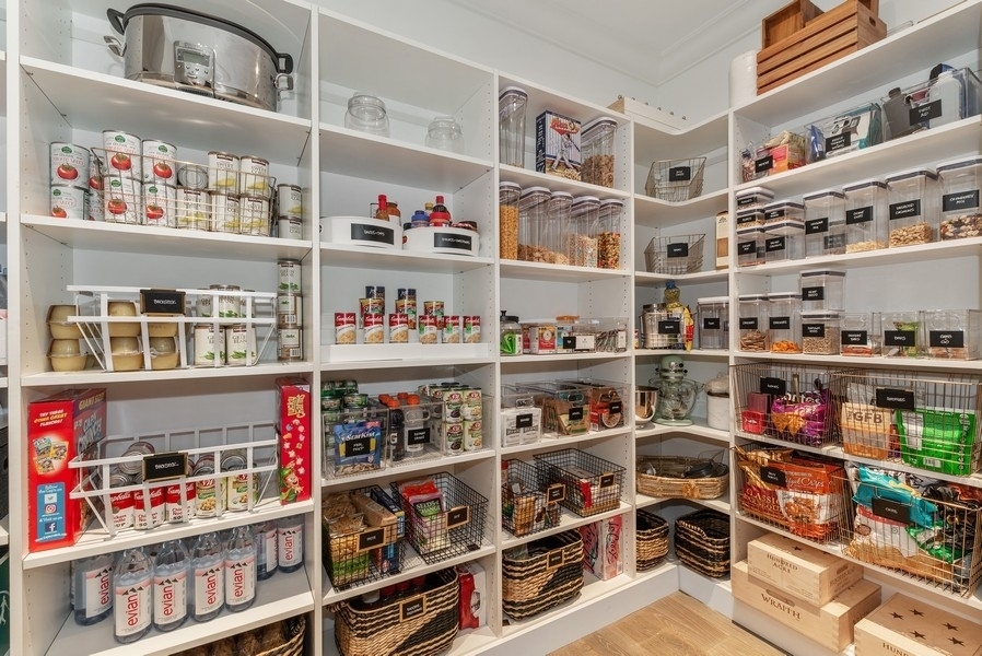 9 West Walton Street, Unit 1901 Chicago, IL 60610 - Photo 19 of 64 a room with a book shelf and a book shelf