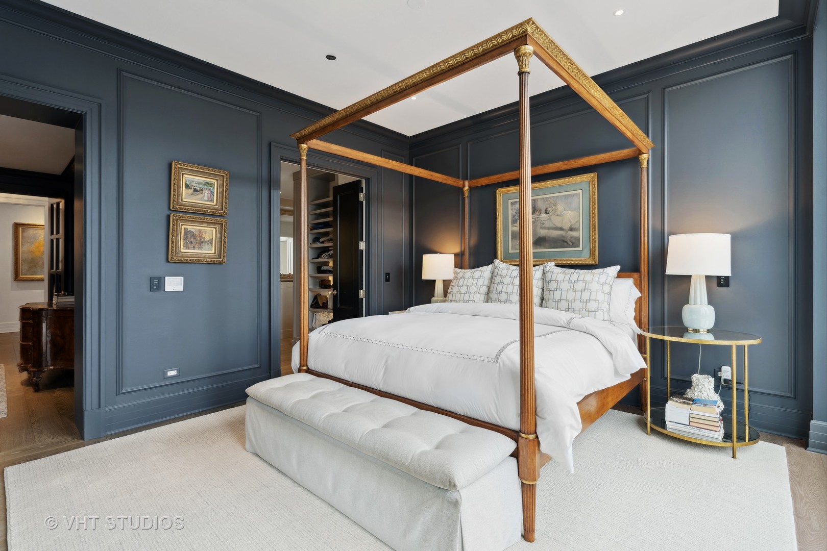 9 West Walton Street, Unit 1901 Chicago, IL 60610 - Photo 28 of 64 a bedroom with a large bed and a chandelier