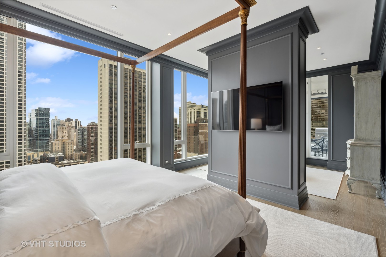 9 West Walton Street, Unit 1901 Chicago, IL 60610 - Photo 29 of 64 a bedroom with a large window and a walk in closet