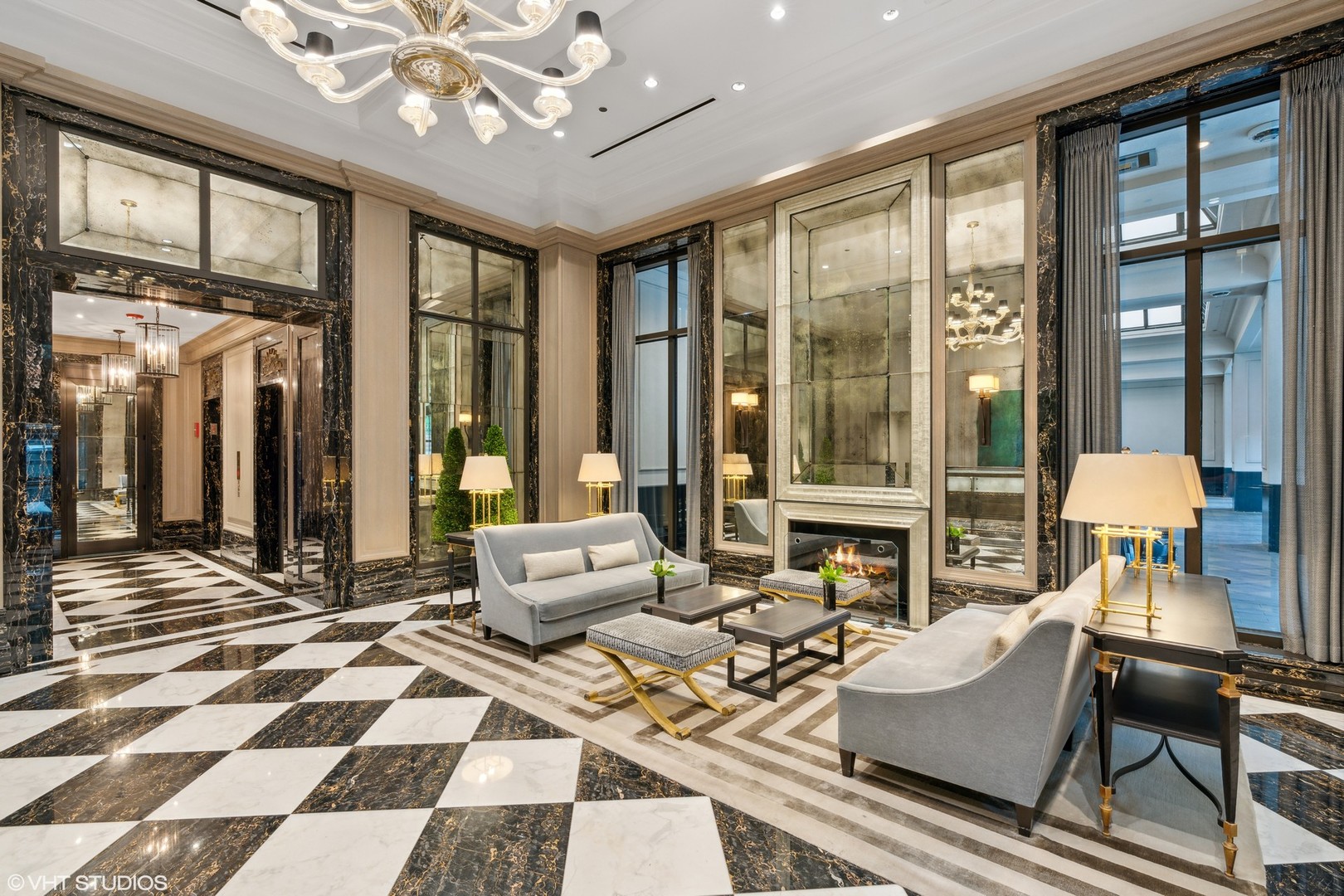 9 West Walton Street, Unit 1901 Chicago, IL 60610 - Photo 3 of 64 a living room with furniture and a large window