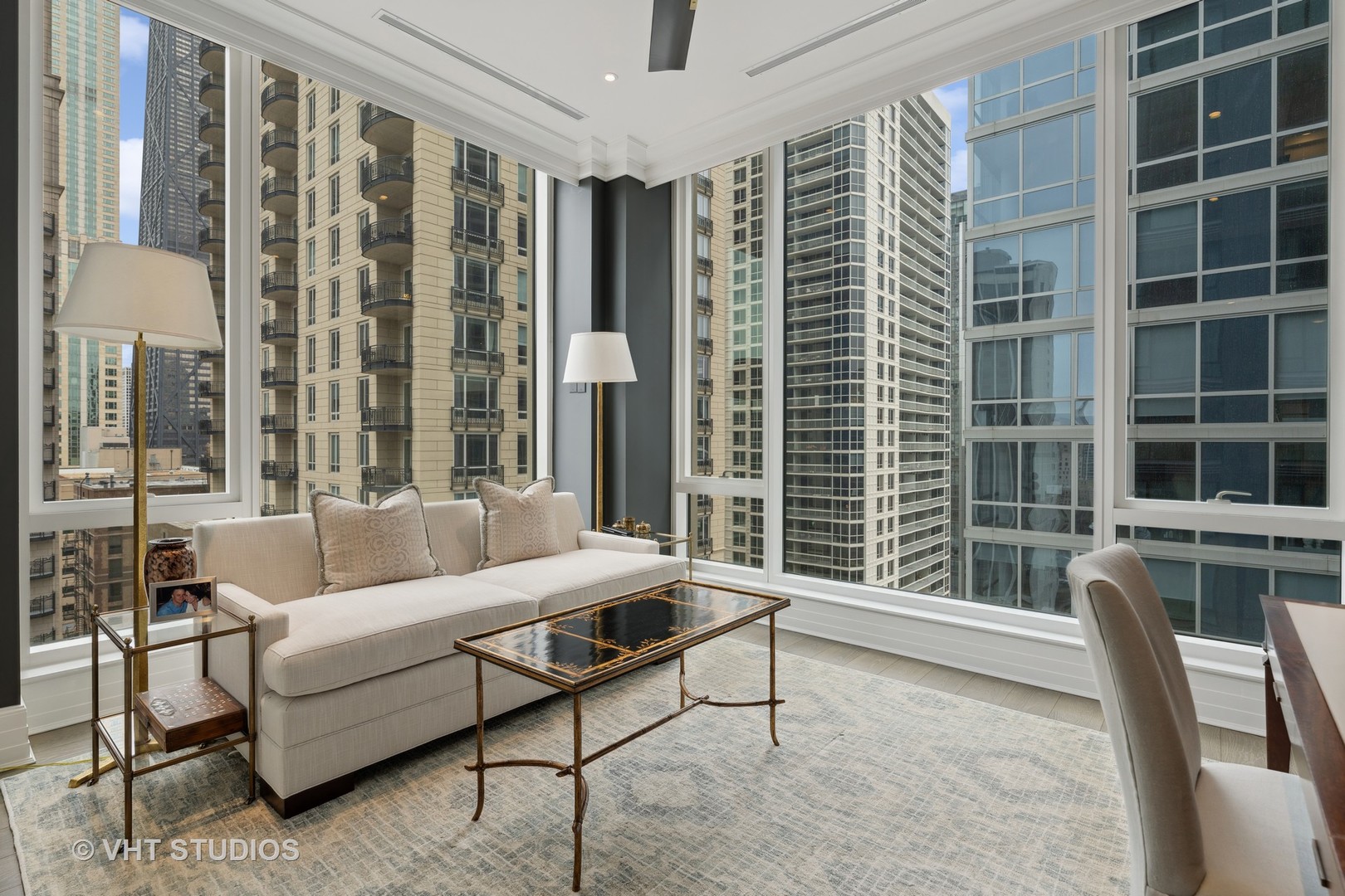 9 West Walton Street, Unit 1901 Chicago, IL 60610 - Photo 42 of 64 a living room with furniture and a window