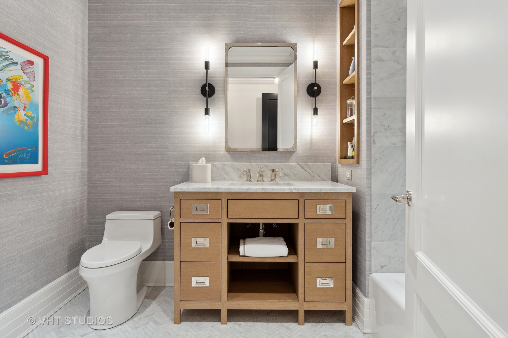 9 West Walton Street, Unit 1901 Chicago, IL 60610 - Photo 44 of 64 a bathroom with a toilet sink and mirror